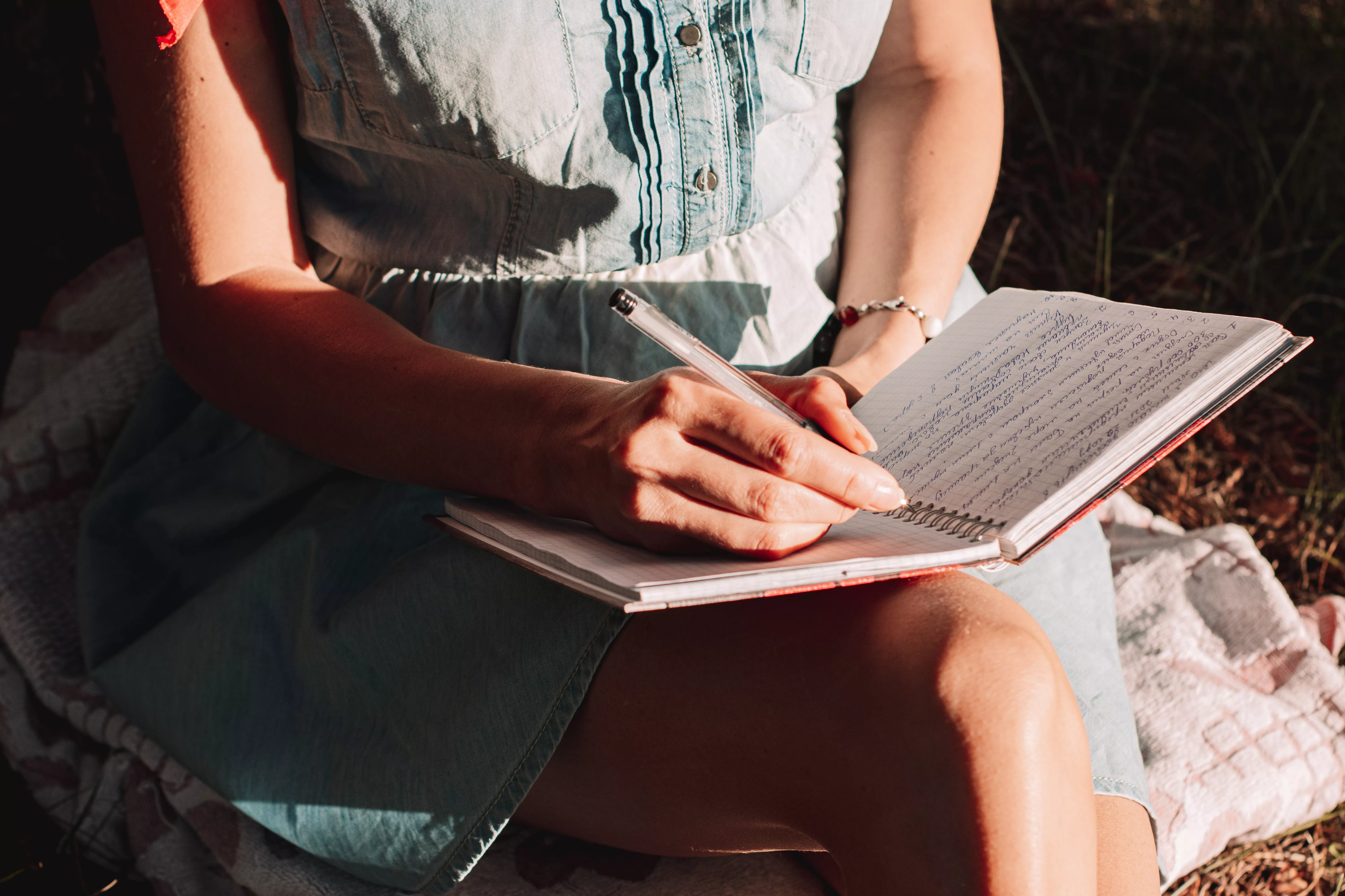midsection woman reading book
