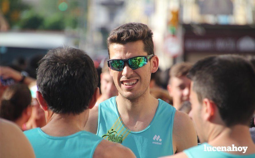 Galería 1: Una marea morada toma las calles de Lucena en la I Carrera Nazarena. Fotos de Jesús Ruiz Jiménez