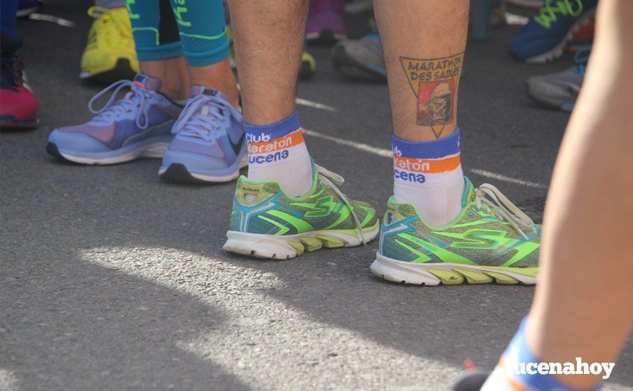 Galería 1: Una marea morada toma las calles de Lucena en la I Carrera Nazarena. Fotos de Jesús Ruiz Jiménez