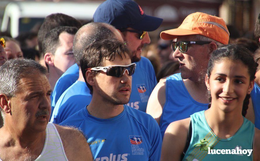 Galería 1: Una marea morada toma las calles de Lucena en la I Carrera Nazarena. Fotos de Jesús Ruiz Jiménez