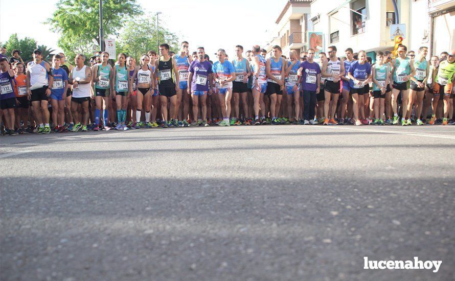 Galería 1: Una marea morada toma las calles de Lucena en la I Carrera Nazarena. Fotos de Jesús Ruiz Jiménez