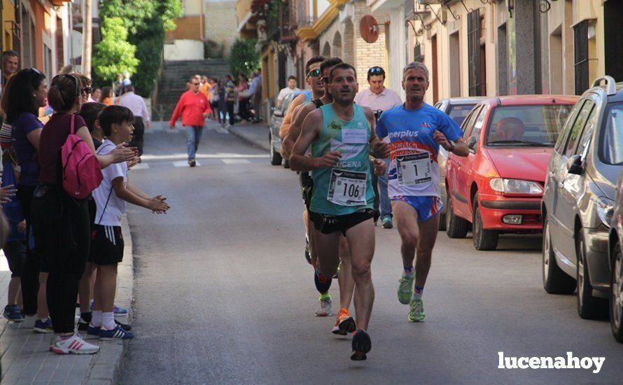 Galería 1: Una marea morada toma las calles de Lucena en la I Carrera Nazarena. Fotos de Jesús Ruiz Jiménez