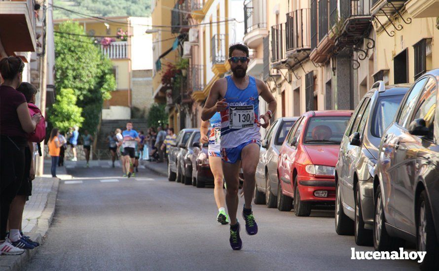 Galería 1: Una marea morada toma las calles de Lucena en la I Carrera Nazarena. Fotos de Jesús Ruiz Jiménez