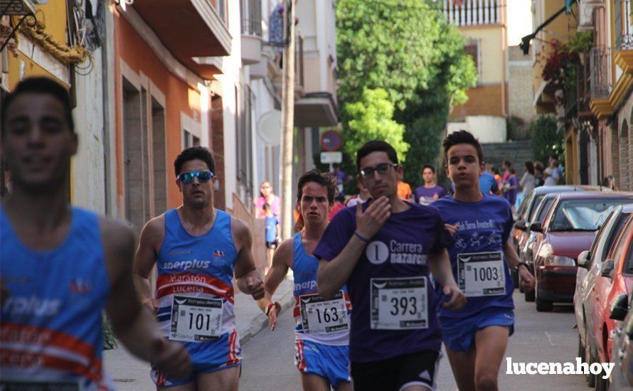 Galería 1: Una marea morada toma las calles de Lucena en la I Carrera Nazarena. Fotos de Jesús Ruiz Jiménez