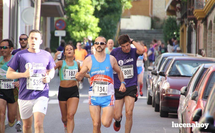 Galería 1: Una marea morada toma las calles de Lucena en la I Carrera Nazarena. Fotos de Jesús Ruiz Jiménez