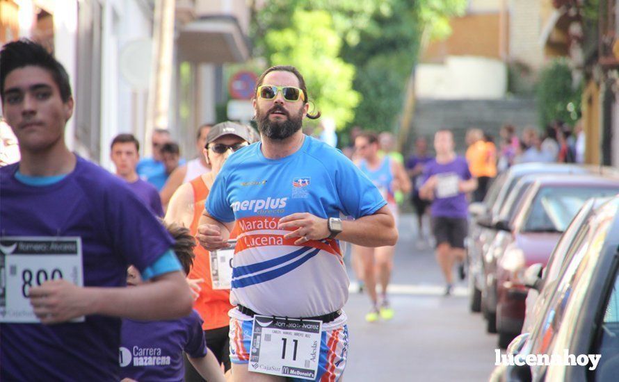 Galería 1: Una marea morada toma las calles de Lucena en la I Carrera Nazarena. Fotos de Jesús Ruiz Jiménez