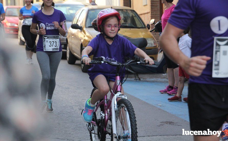 Galería 1: Una marea morada toma las calles de Lucena en la I Carrera Nazarena. Fotos de Jesús Ruiz Jiménez