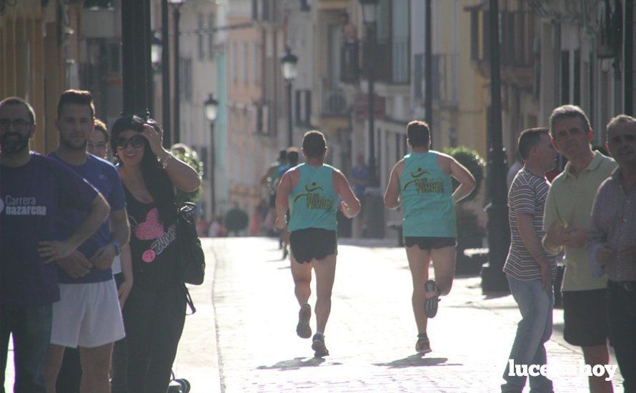 Galería 1: Una marea morada toma las calles de Lucena en la I Carrera Nazarena. Fotos de Jesús Ruiz Jiménez