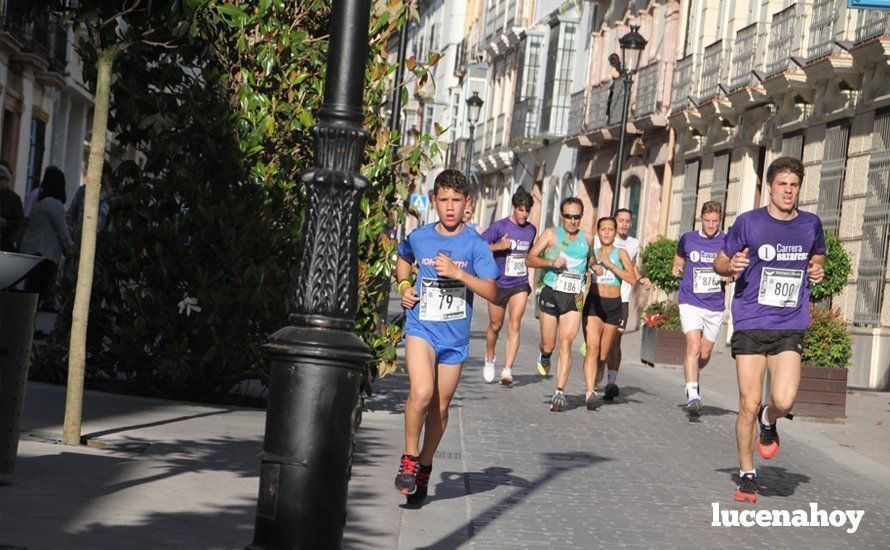 Galería 1: Una marea morada toma las calles de Lucena en la I Carrera Nazarena. Fotos de Jesús Ruiz Jiménez