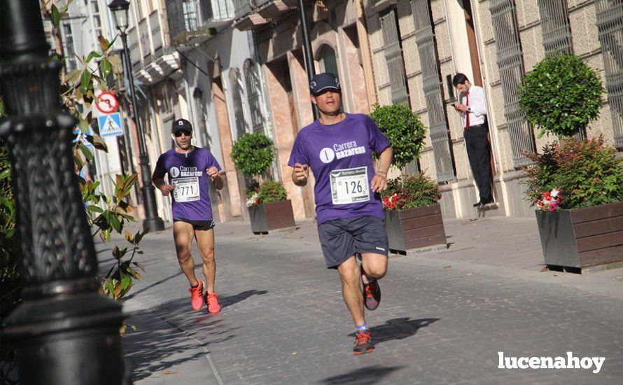 Galería 1: Una marea morada toma las calles de Lucena en la I Carrera Nazarena. Fotos de Jesús Ruiz Jiménez