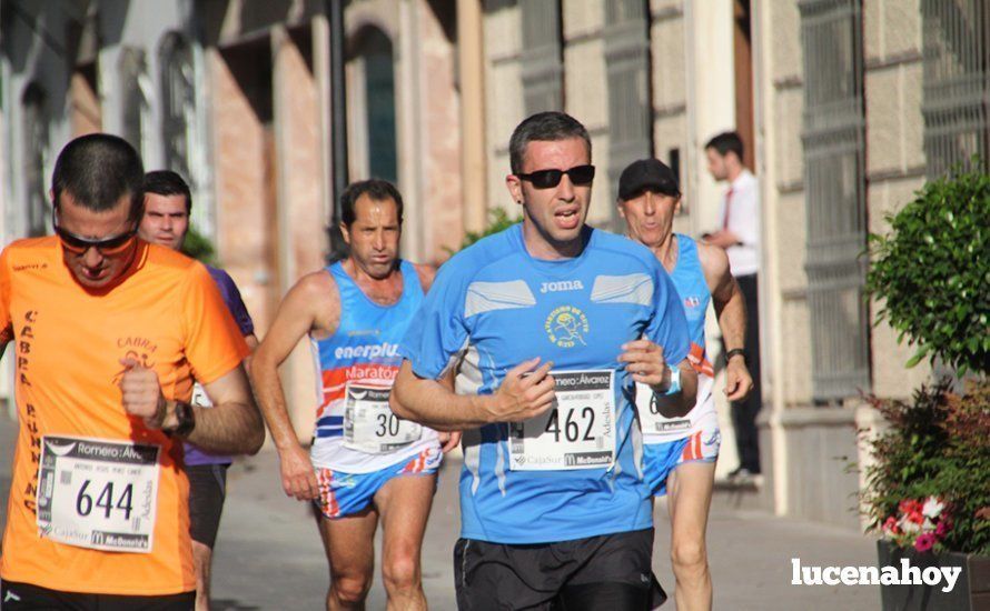 Galería 1: Una marea morada toma las calles de Lucena en la I Carrera Nazarena. Fotos de Jesús Ruiz Jiménez