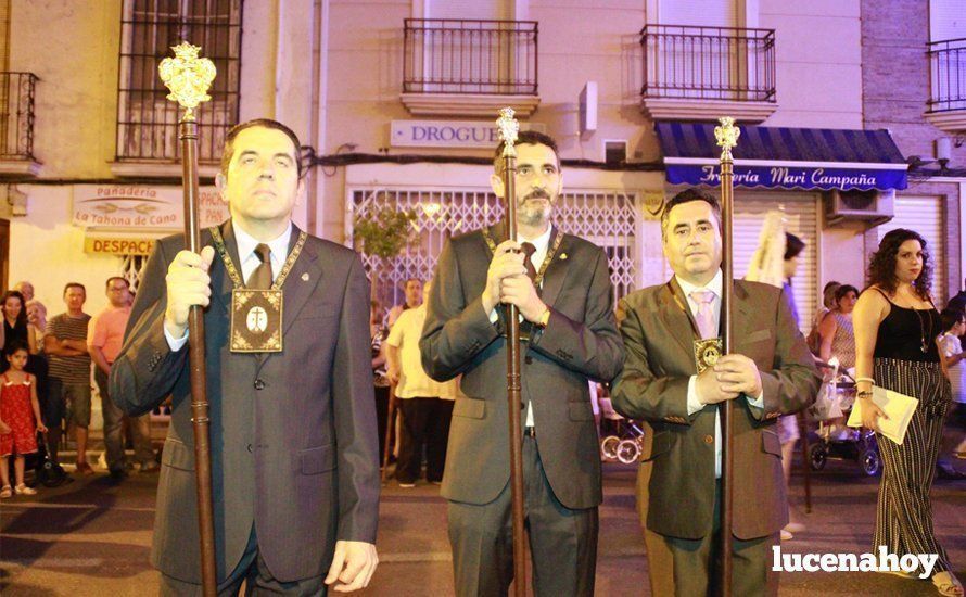 Galería: La Virgen del Carmen, de nuevo bajo palio, recorre con brillantez las calles de su barrio en solemne procesión