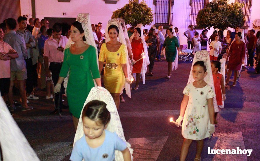 Galería: La Virgen del Carmen, de nuevo bajo palio, recorre con brillantez las calles de su barrio en solemne procesión