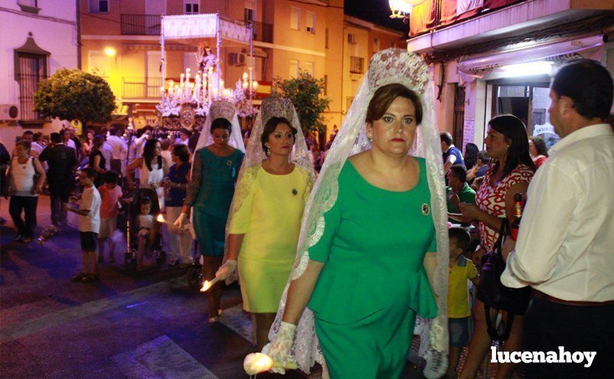 Galería: La Virgen del Carmen, de nuevo bajo palio, recorre con brillantez las calles de su barrio en solemne procesión