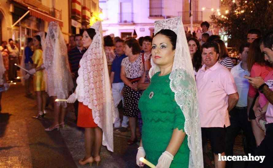 Galería: La Virgen del Carmen, de nuevo bajo palio, recorre con brillantez las calles de su barrio en solemne procesión