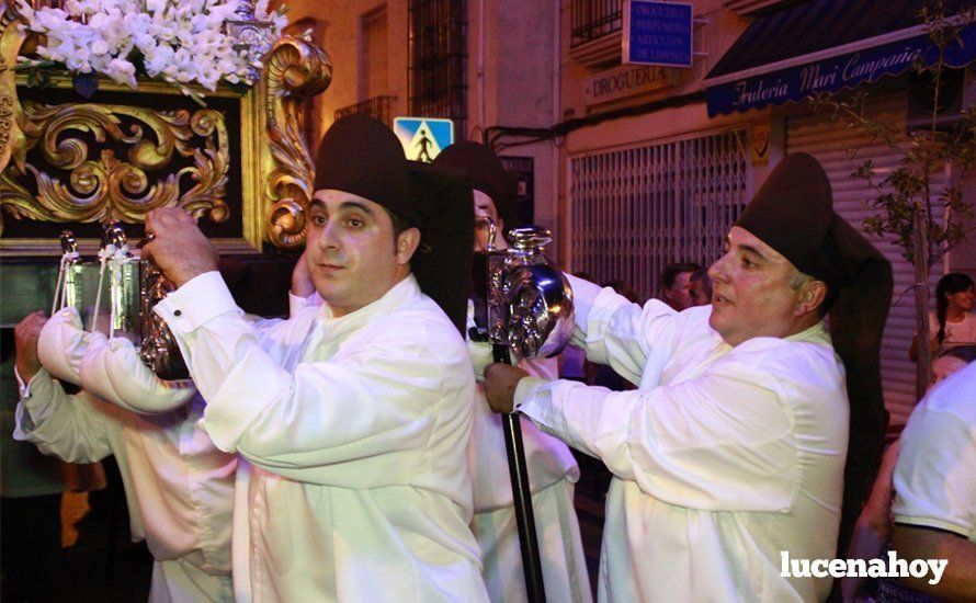 Galería: La Virgen del Carmen, de nuevo bajo palio, recorre con brillantez las calles de su barrio en solemne procesión