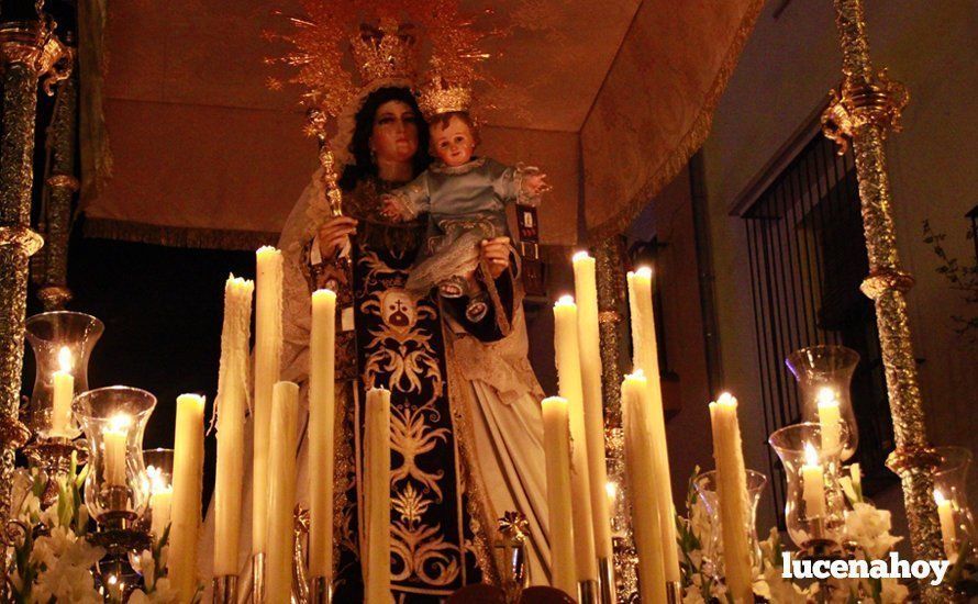 Galería: La Virgen del Carmen, de nuevo bajo palio, recorre con brillantez las calles de su barrio en solemne procesión