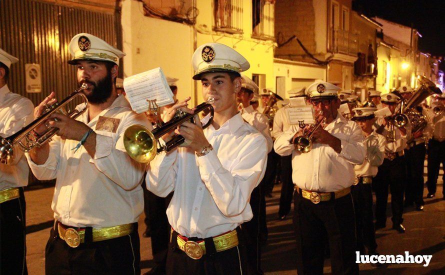 Galería: La Virgen del Carmen, de nuevo bajo palio, recorre con brillantez las calles de su barrio en solemne procesión