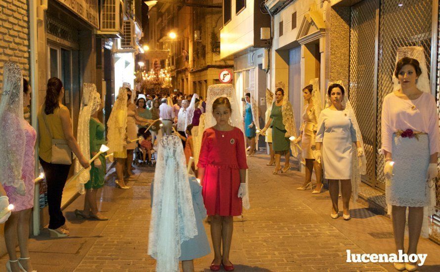 Galería: La Virgen del Carmen, de nuevo bajo palio, recorre con brillantez las calles de su barrio en solemne procesión