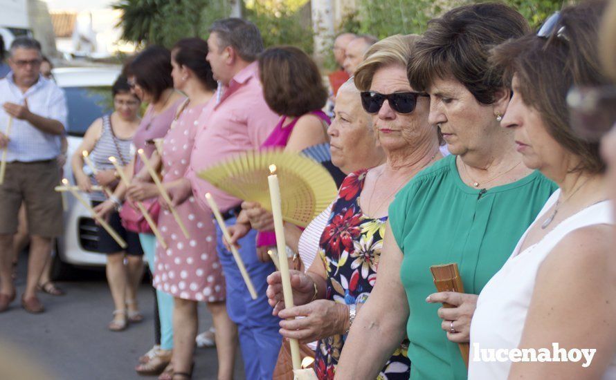 Galería: Un grupo de mujeres porta a Santa Marta por el barrio del Valle tras su restauración