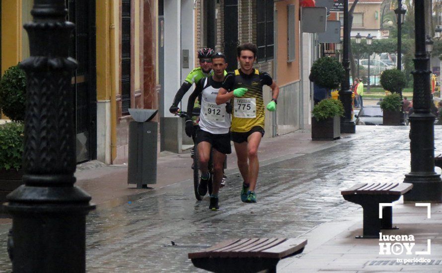 Galería: Mil y un valientes se divierten bajo la lluvia en la IV Media Maratón de Lucena