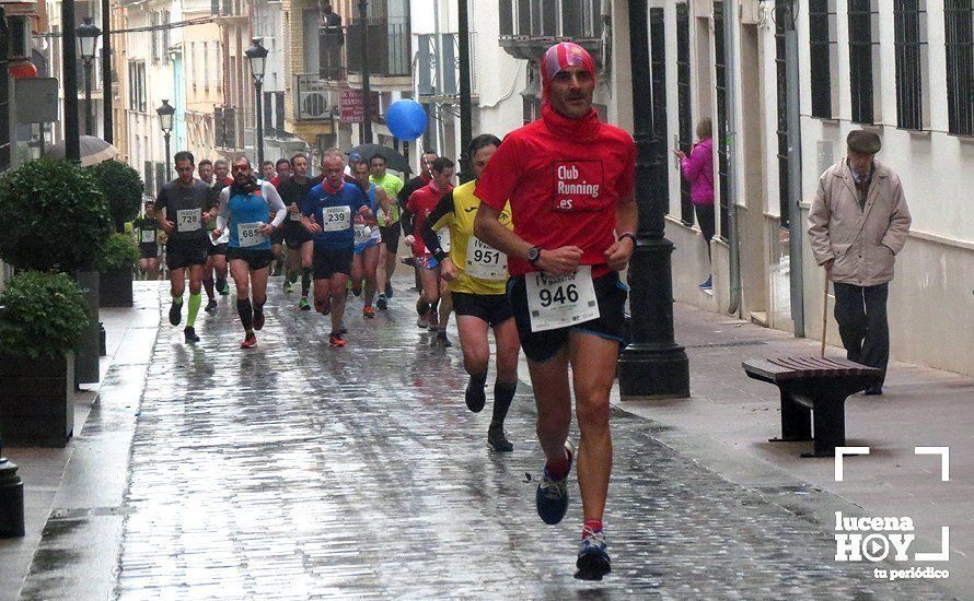 Galería: Mil y un valientes se divierten bajo la lluvia en la IV Media Maratón de Lucena