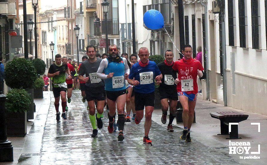 Galería: Mil y un valientes se divierten bajo la lluvia en la IV Media Maratón de Lucena