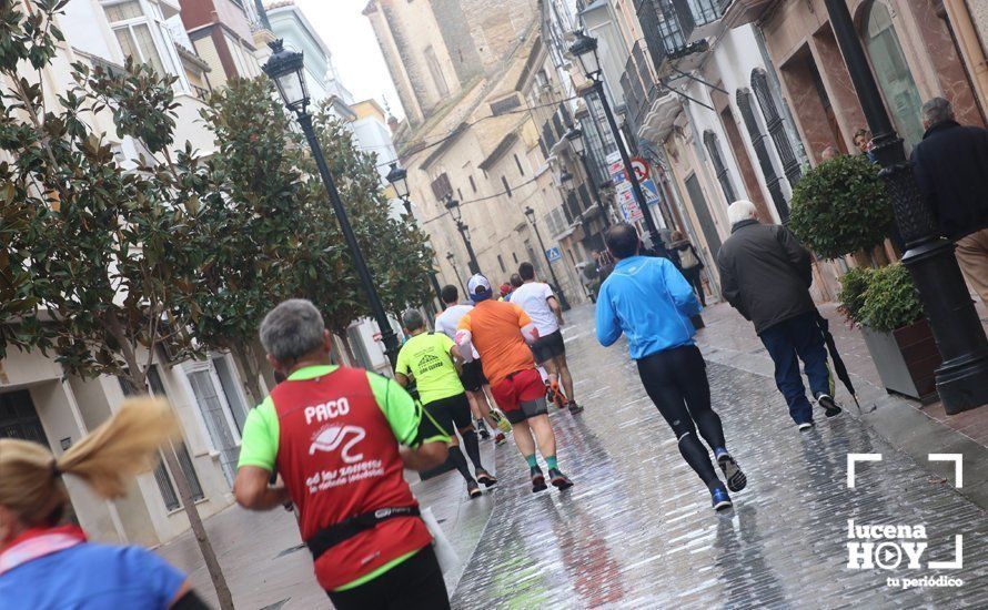 Galería: Mil y un valientes se divierten bajo la lluvia en la IV Media Maratón de Lucena