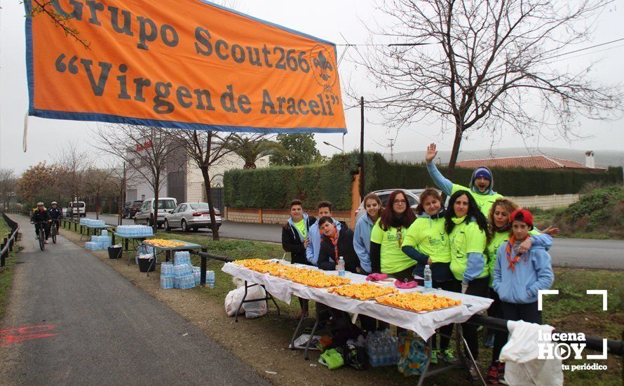 Galería: Mil y un valientes se divierten bajo la lluvia en la IV Media Maratón de Lucena