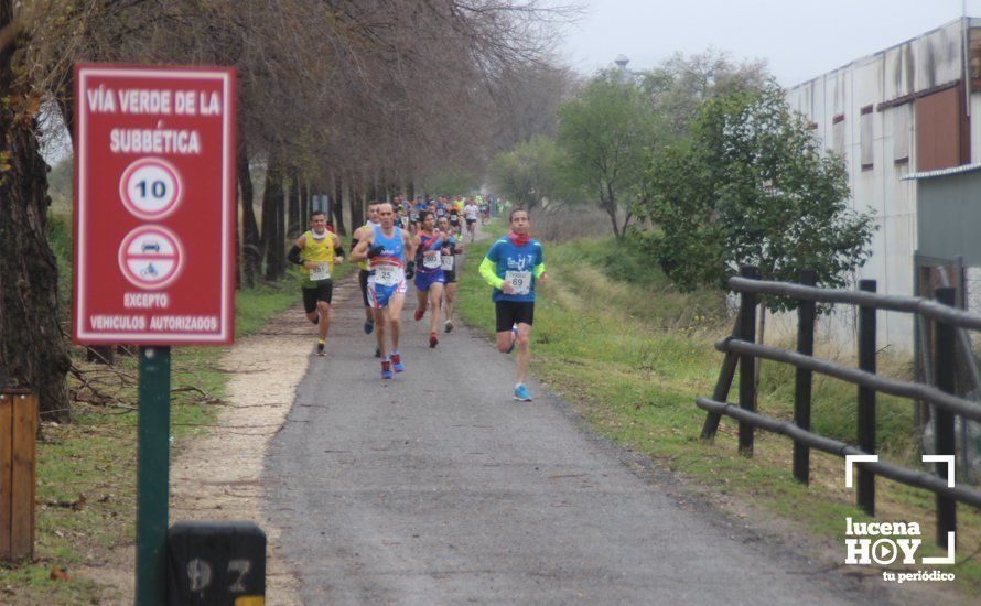 Galería: Mil y un valientes se divierten bajo la lluvia en la IV Media Maratón de Lucena