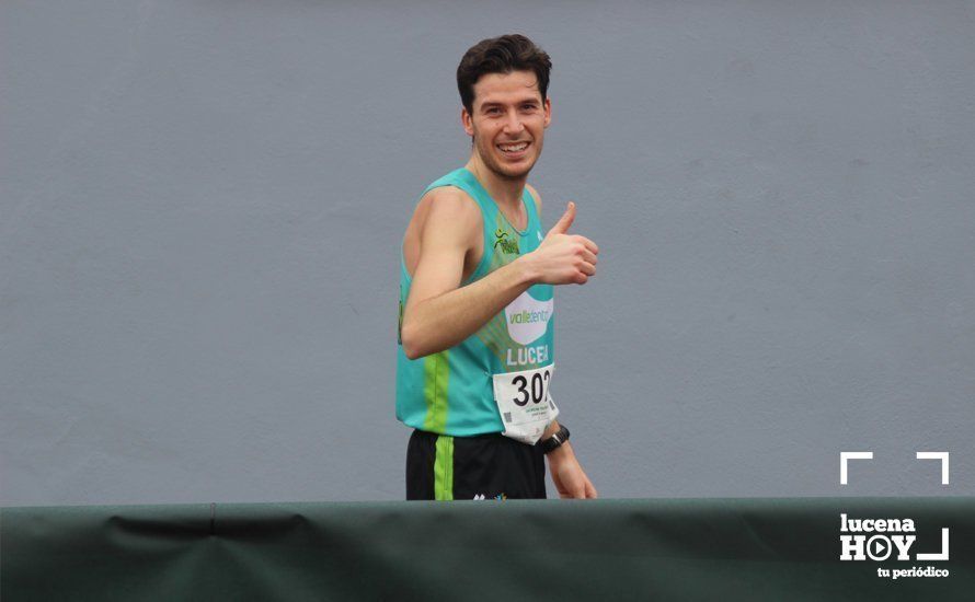 Galería: Mil y un valientes se divierten bajo la lluvia en la IV Media Maratón de Lucena