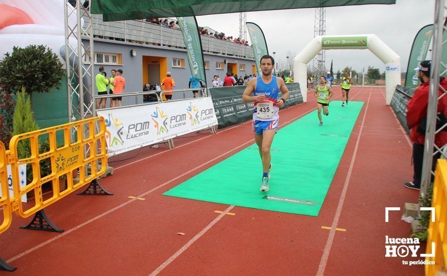 Galería: Mil y un valientes se divierten bajo la lluvia en la IV Media Maratón de Lucena