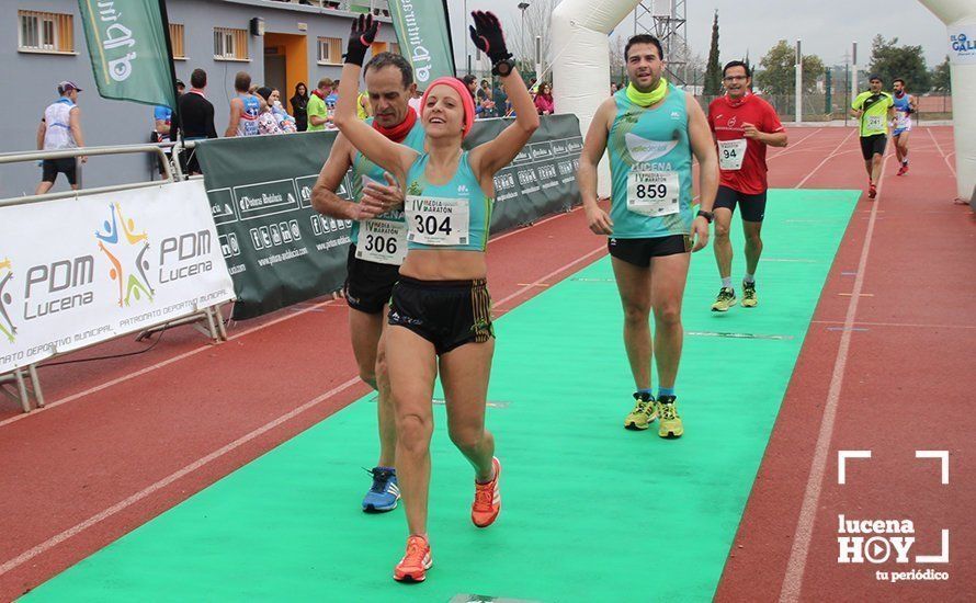 Galería: Mil y un valientes se divierten bajo la lluvia en la IV Media Maratón de Lucena