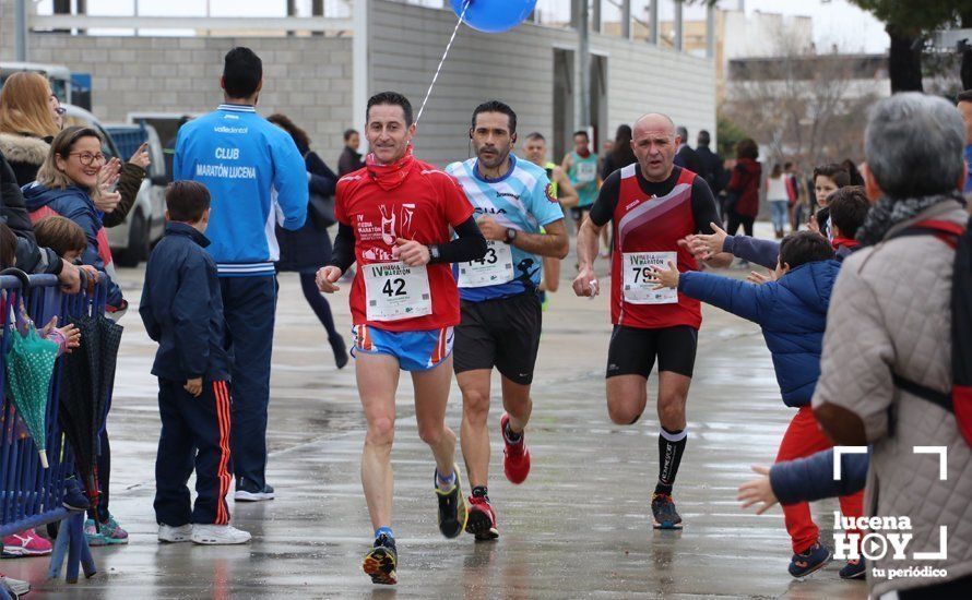 Galería: Mil y un valientes se divierten bajo la lluvia en la IV Media Maratón de Lucena