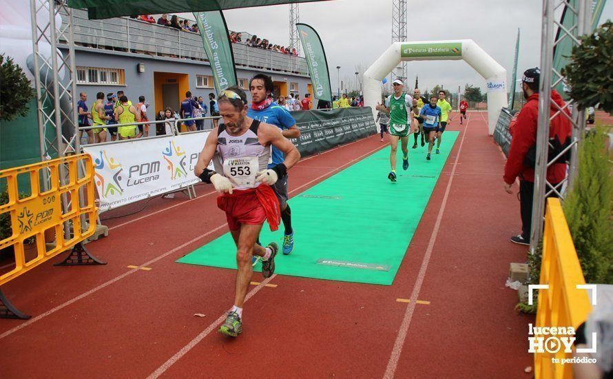 Galería: Mil y un valientes se divierten bajo la lluvia en la IV Media Maratón de Lucena