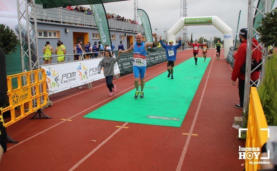 Galería: Mil y un valientes se divierten bajo la lluvia en la IV Media Maratón de Lucena