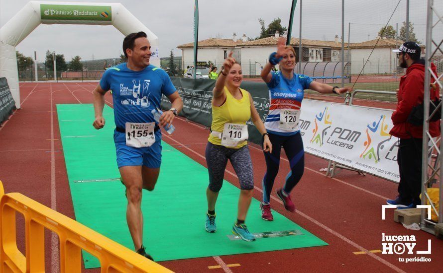 Galería: Mil y un valientes se divierten bajo la lluvia en la IV Media Maratón de Lucena