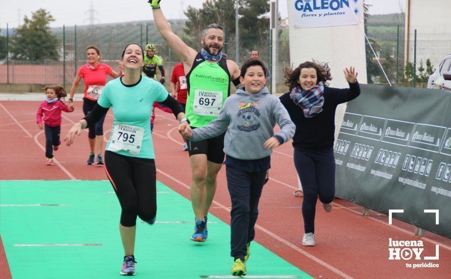 Galería: Mil y un valientes se divierten bajo la lluvia en la IV Media Maratón de Lucena