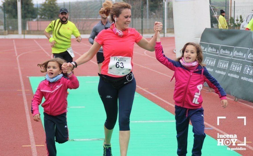 Galería: Mil y un valientes se divierten bajo la lluvia en la IV Media Maratón de Lucena