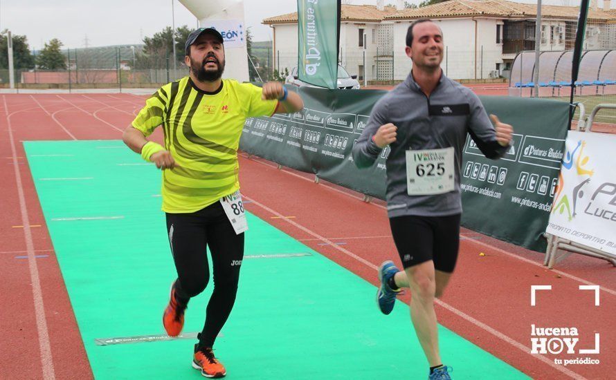 Galería: Mil y un valientes se divierten bajo la lluvia en la IV Media Maratón de Lucena