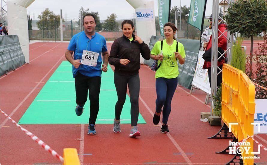 Galería: Mil y un valientes se divierten bajo la lluvia en la IV Media Maratón de Lucena