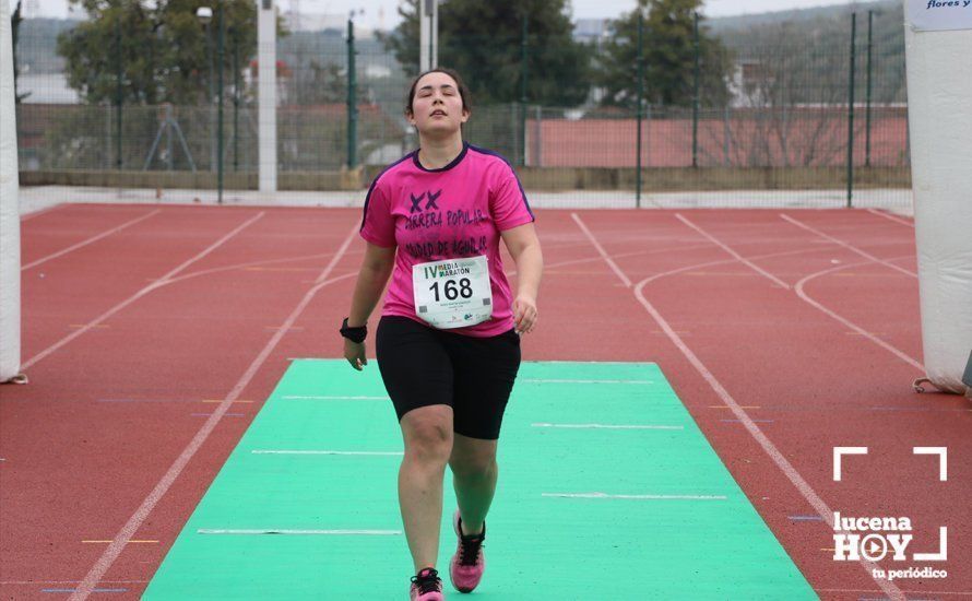 Galería: Mil y un valientes se divierten bajo la lluvia en la IV Media Maratón de Lucena