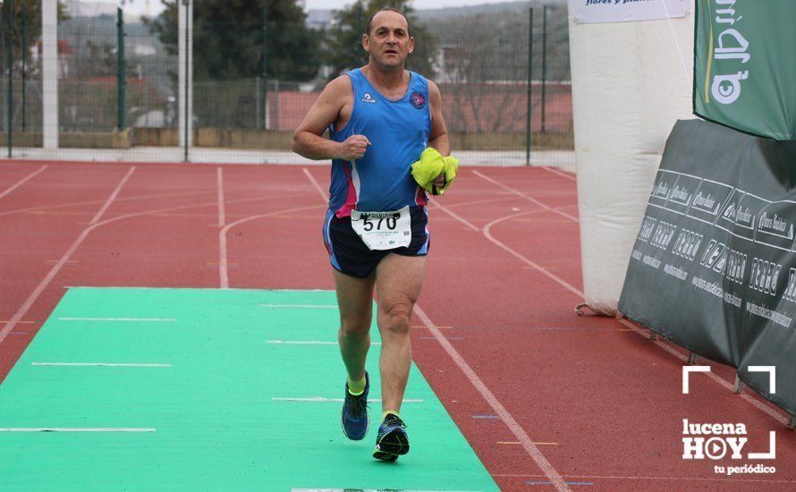 Galería: Mil y un valientes se divierten bajo la lluvia en la IV Media Maratón de Lucena