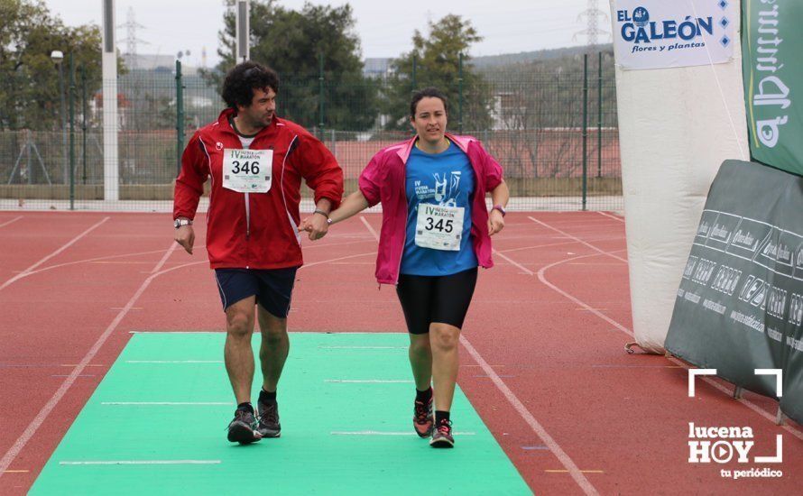 Galería: Mil y un valientes se divierten bajo la lluvia en la IV Media Maratón de Lucena