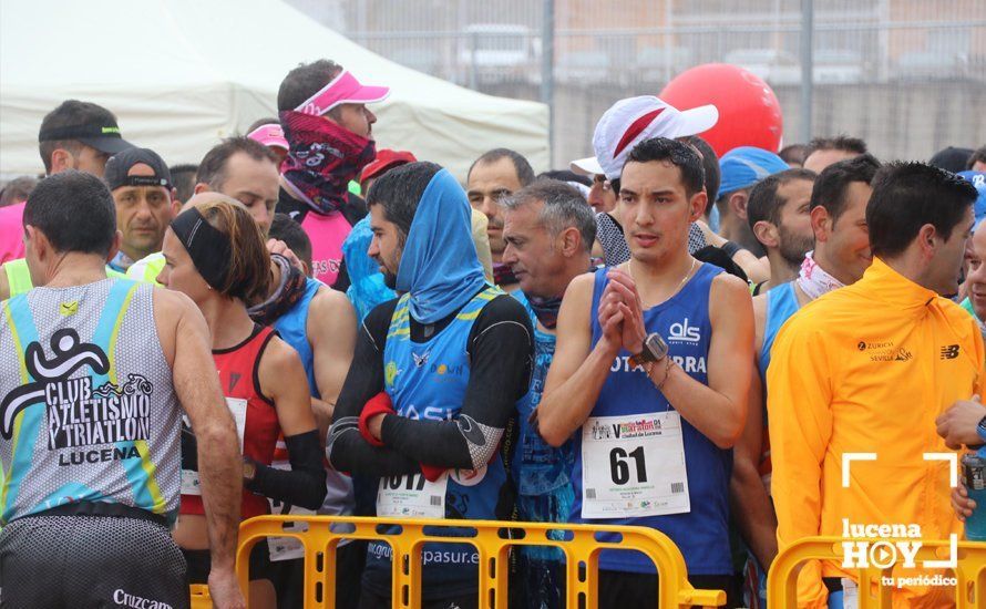 GALERÍA: Mounir Elouardi y Nazha Machrouh repiten reinado bajo el diluvio en la Media Maraton de Lucena