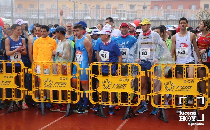 GALERÍA: Mounir Elouardi y Nazha Machrouh repiten reinado bajo el diluvio en la Media Maraton de Lucena