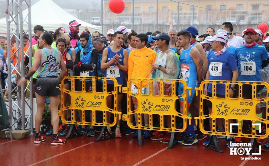 GALERÍA: Mounir Elouardi y Nazha Machrouh repiten reinado bajo el diluvio en la Media Maraton de Lucena