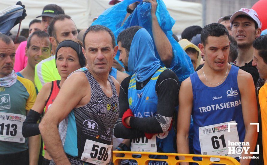 GALERÍA: Mounir Elouardi y Nazha Machrouh repiten reinado bajo el diluvio en la Media Maraton de Lucena