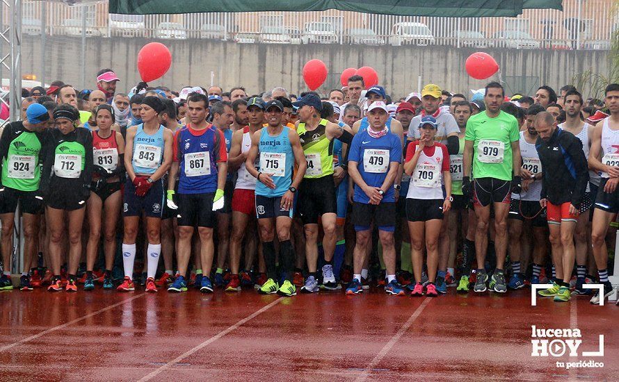 GALERÍA: Mounir Elouardi y Nazha Machrouh repiten reinado bajo el diluvio en la Media Maraton de Lucena