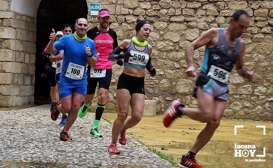 GALERÍA: Mounir Elouardi y Nazha Machrouh repiten reinado bajo el diluvio en la Media Maraton de Lucena